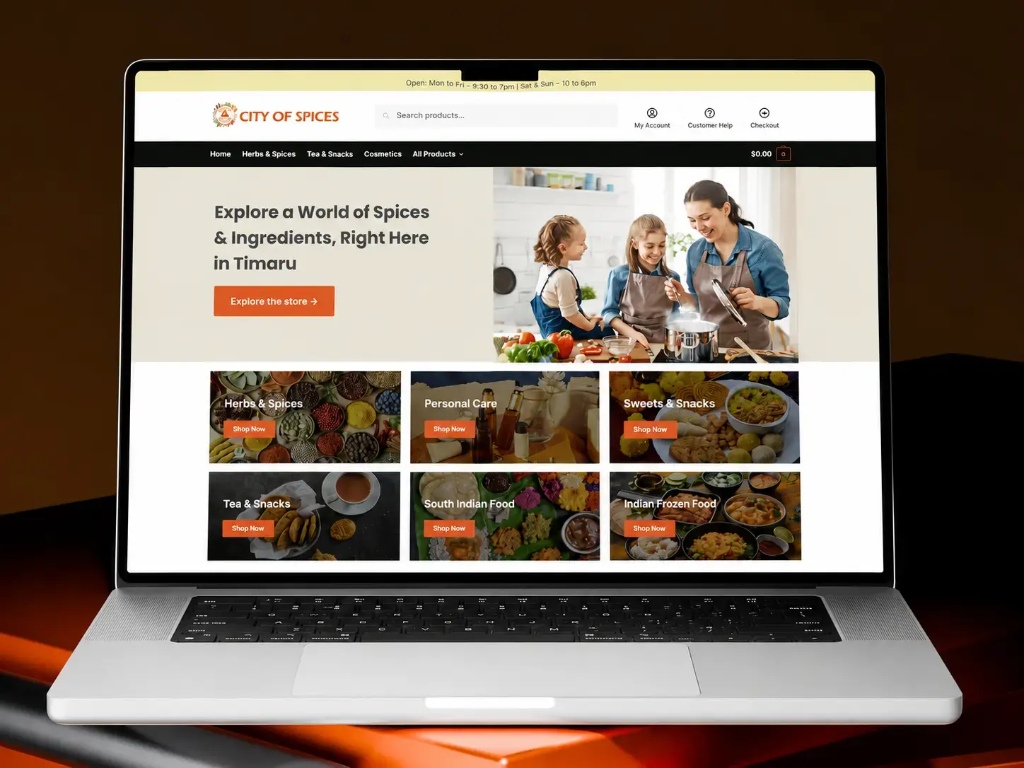 The City of Spices homepage on a laptop, with the Timaru storefront banner and shop-by-category tiles